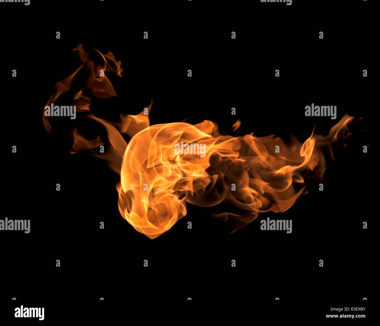 Burning flame or fire isolated on black background Stock Photo - Alamy