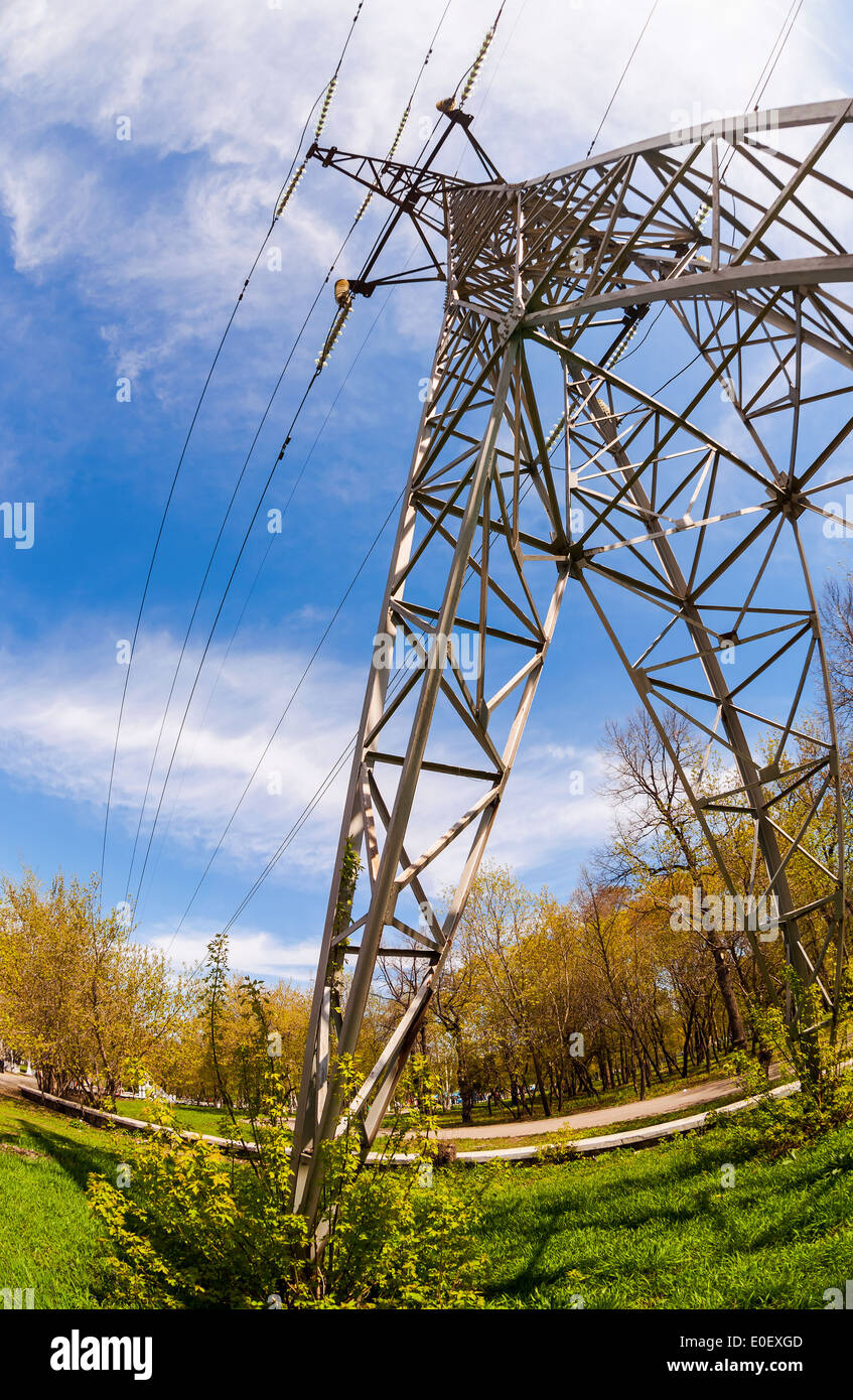 High voltage electric tower against blue sky Stock Photo - Alamy