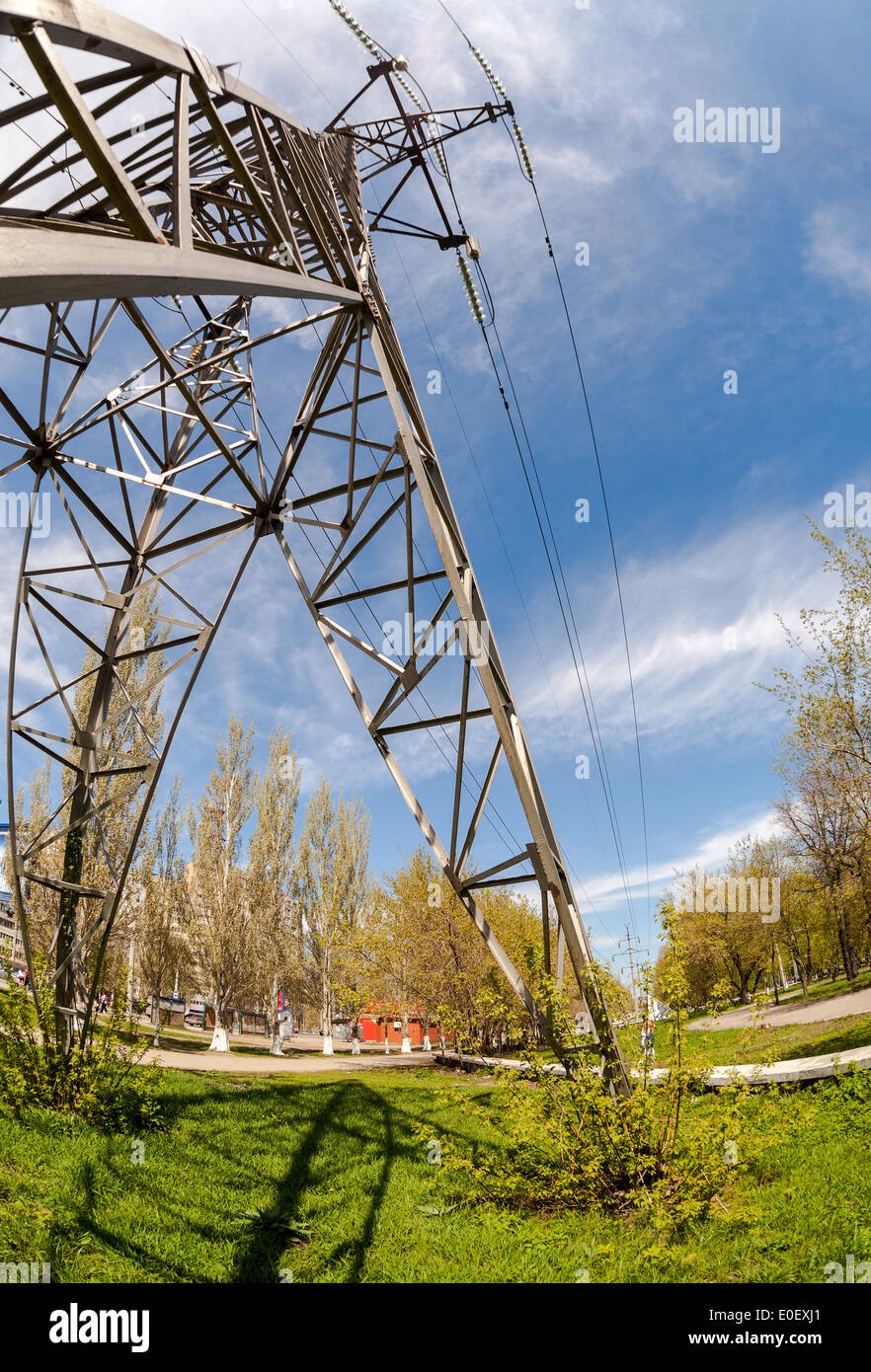 High voltage electric tower against blue sky Stock Photo - Alamy