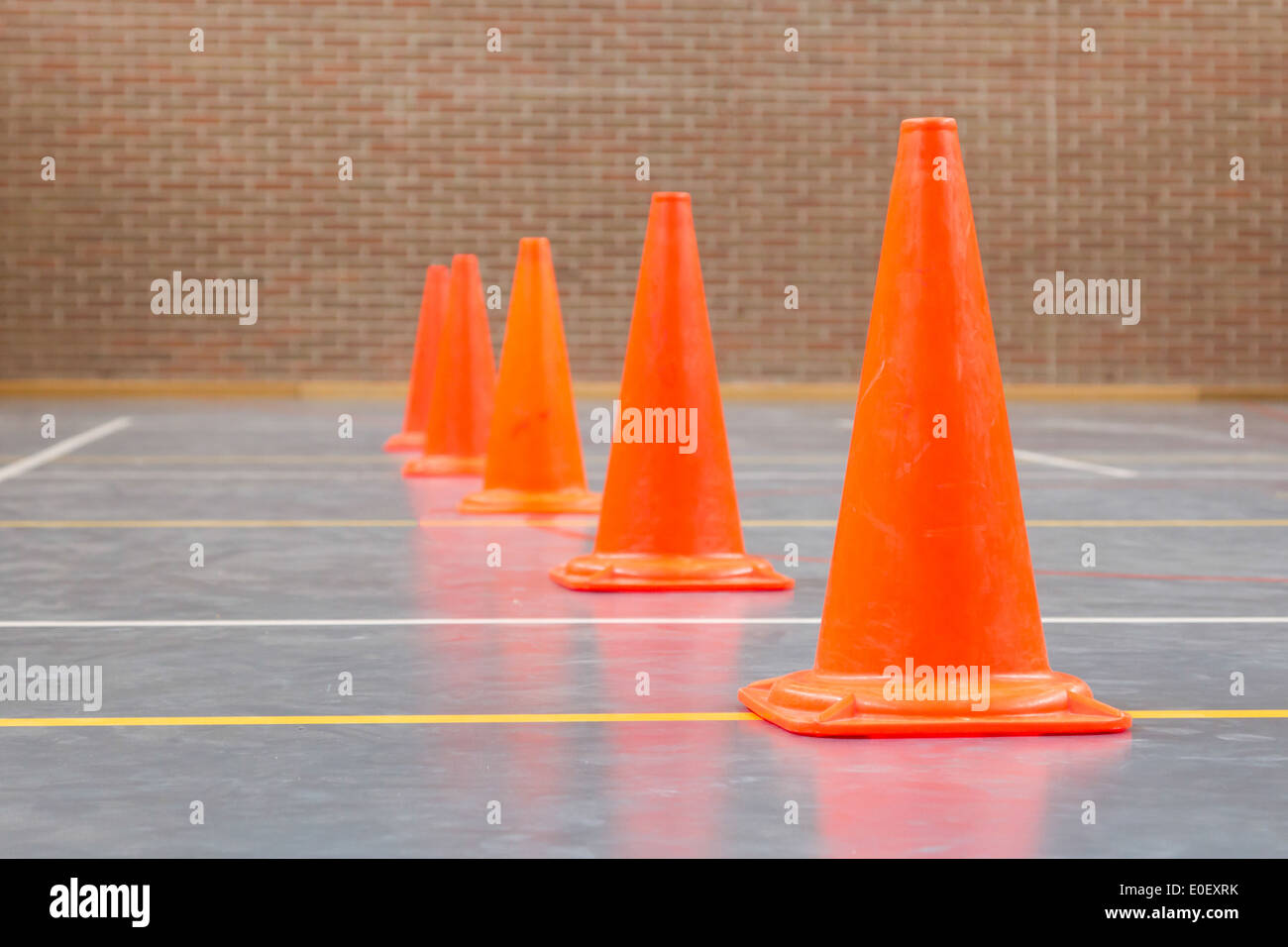 Interior of a gym at school  red cones on a row Stock Photo