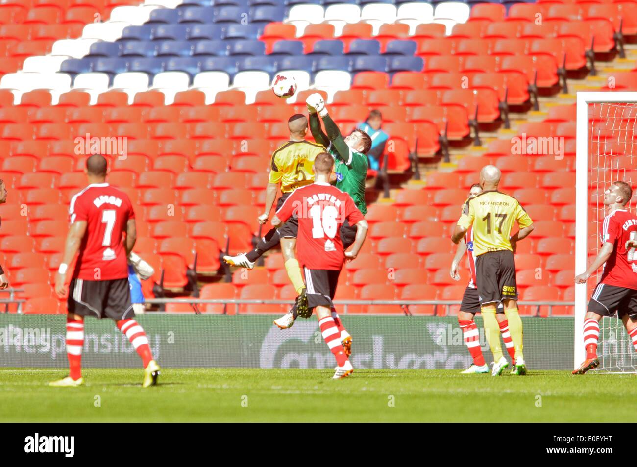 London, UK. 10th May, 2014. Man of the Match, Matt Brown of Sholing Town FC punches a cross clear during the FA Vase Final 2014, deying West Auckland Town FC Credit:  Flashspix/Alamy Live News Stock Photo