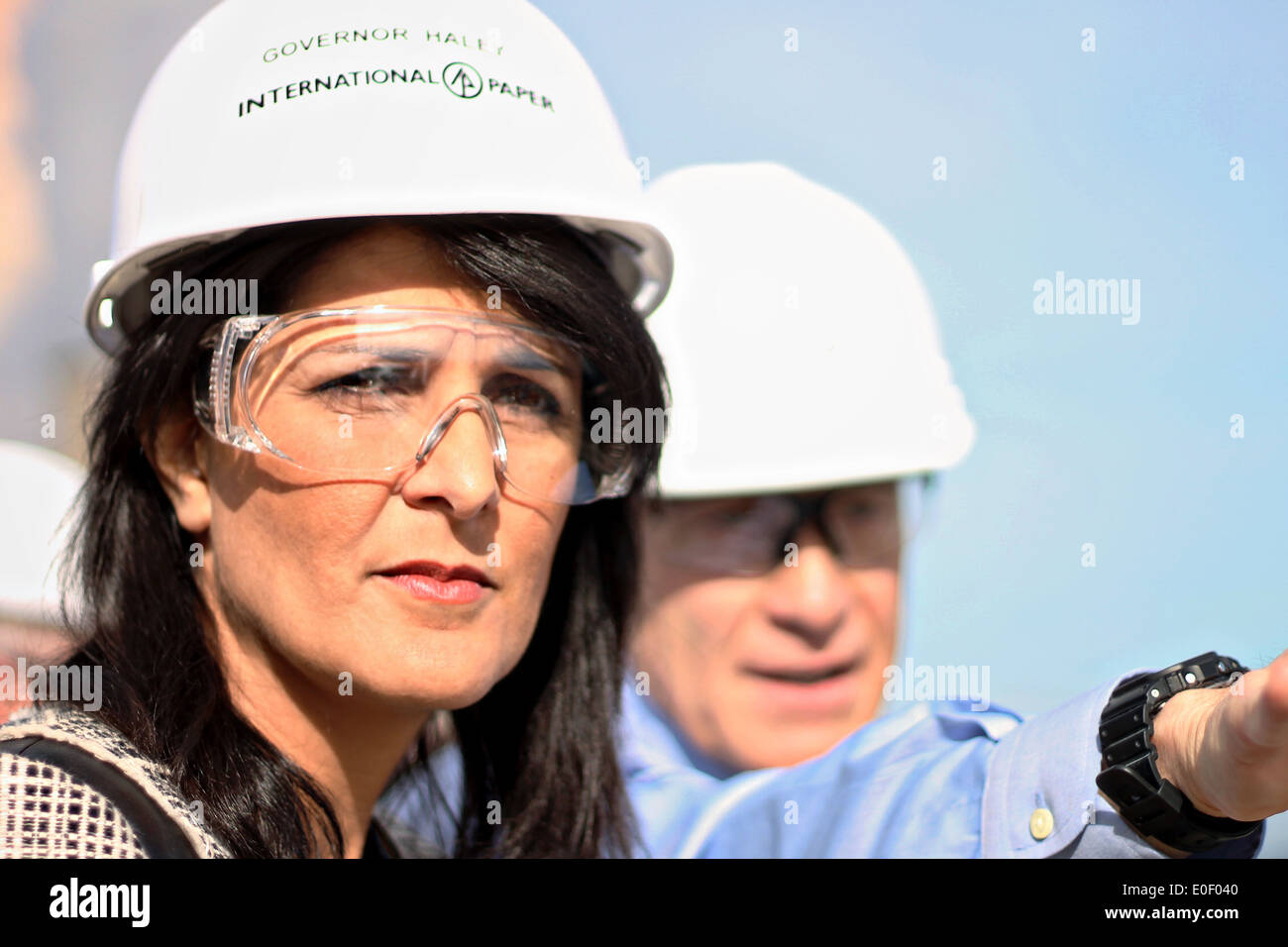 South Carolina Governor Nikki Haley wearing a hard hat tours the