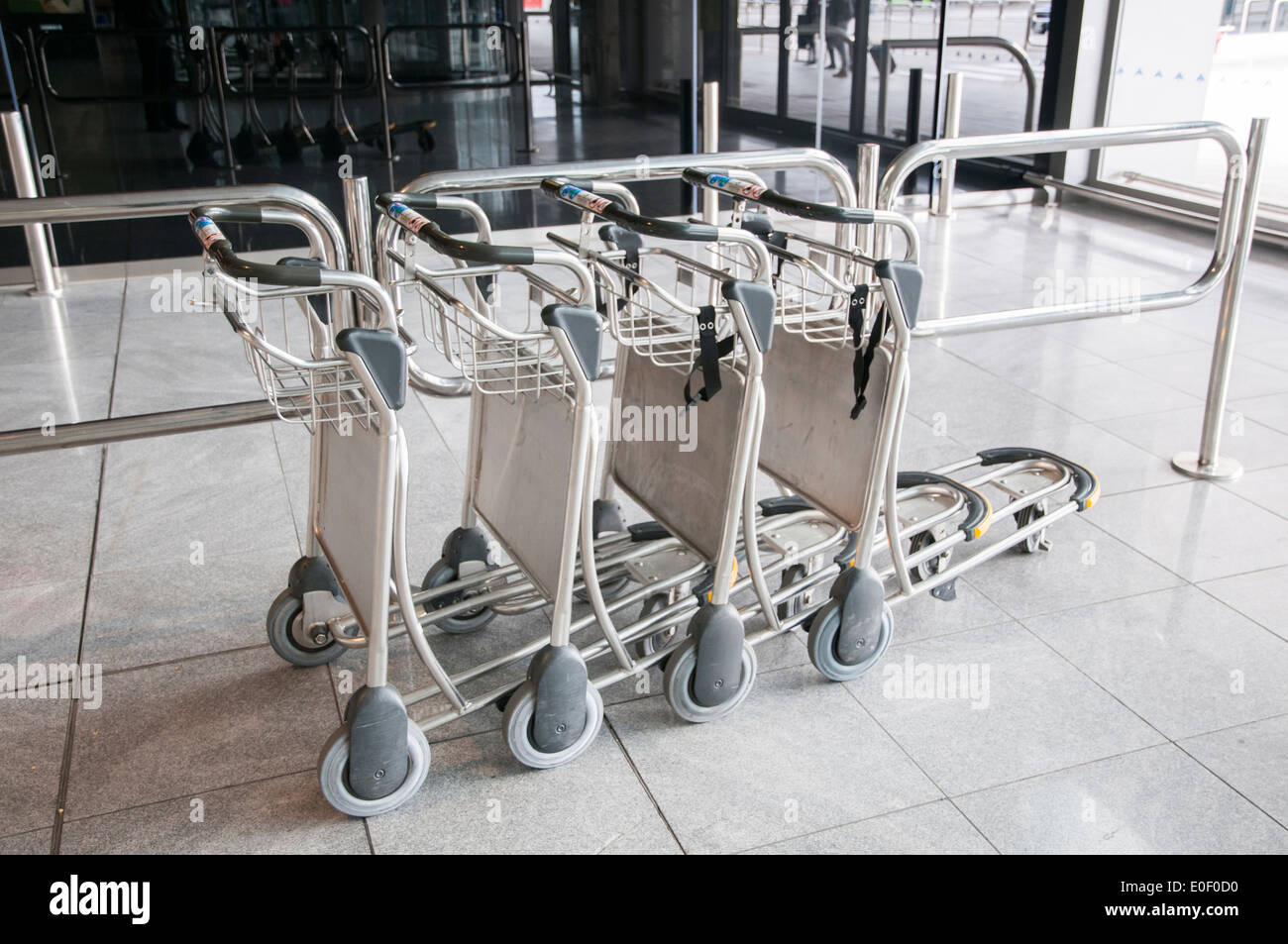 luggage carts at Barcelona airport, Spain Stock Photo