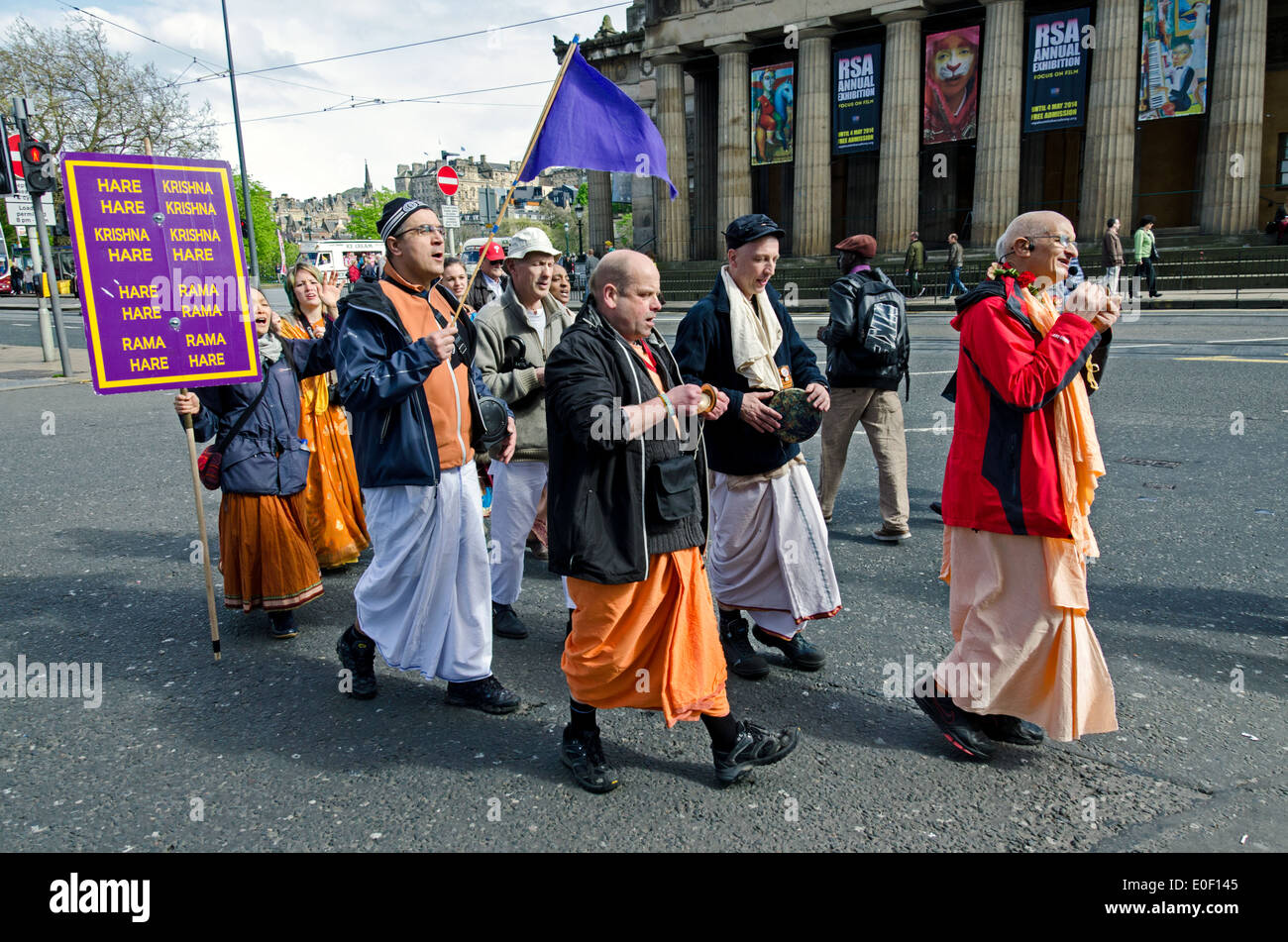Members of the Hare Krishna movement chant as they walk along Princes street in Edinburgh, Scotland, UK. Stock Photo