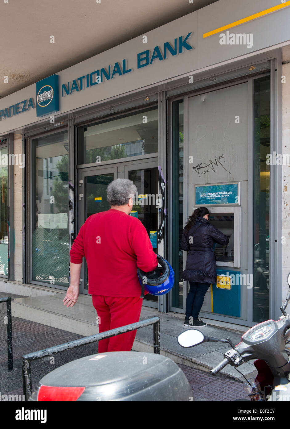 national bank cash money dispenser person greece Stock Photo Alamy