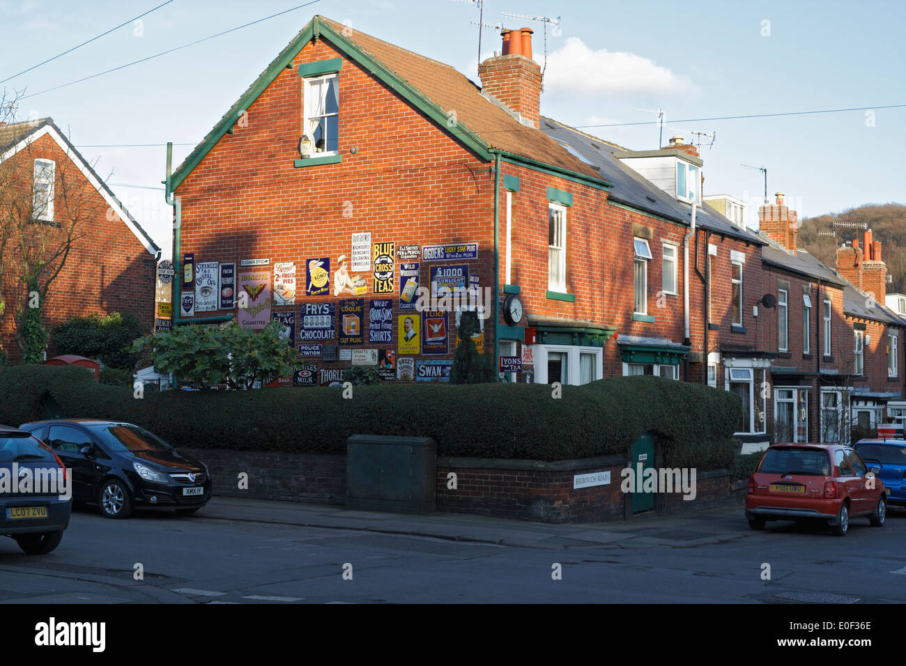 End of Terrace House with Old Vintage Shops signs Woodseats Sheffield England Stock Photo