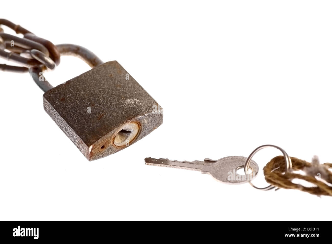 A padlock and a key, isolated on white. Stock Photo