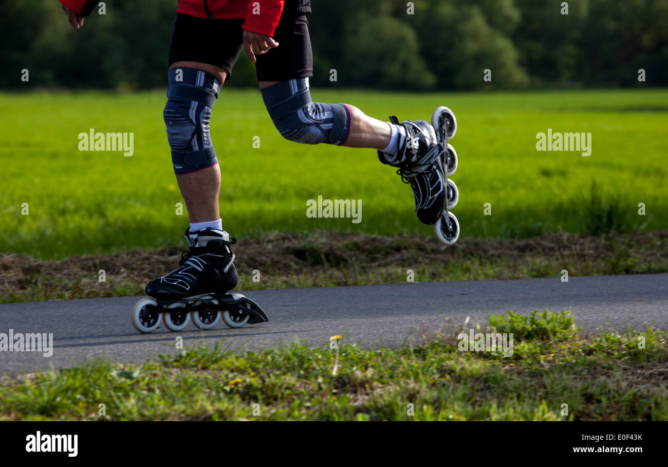 Inline skating on path Stock Photo Alamy