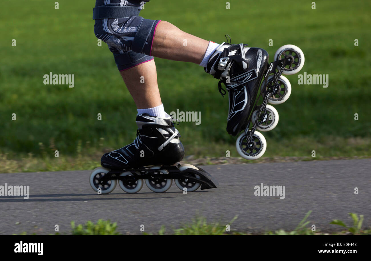 rollerblades roller skating on trail, inline skates Stock Photo