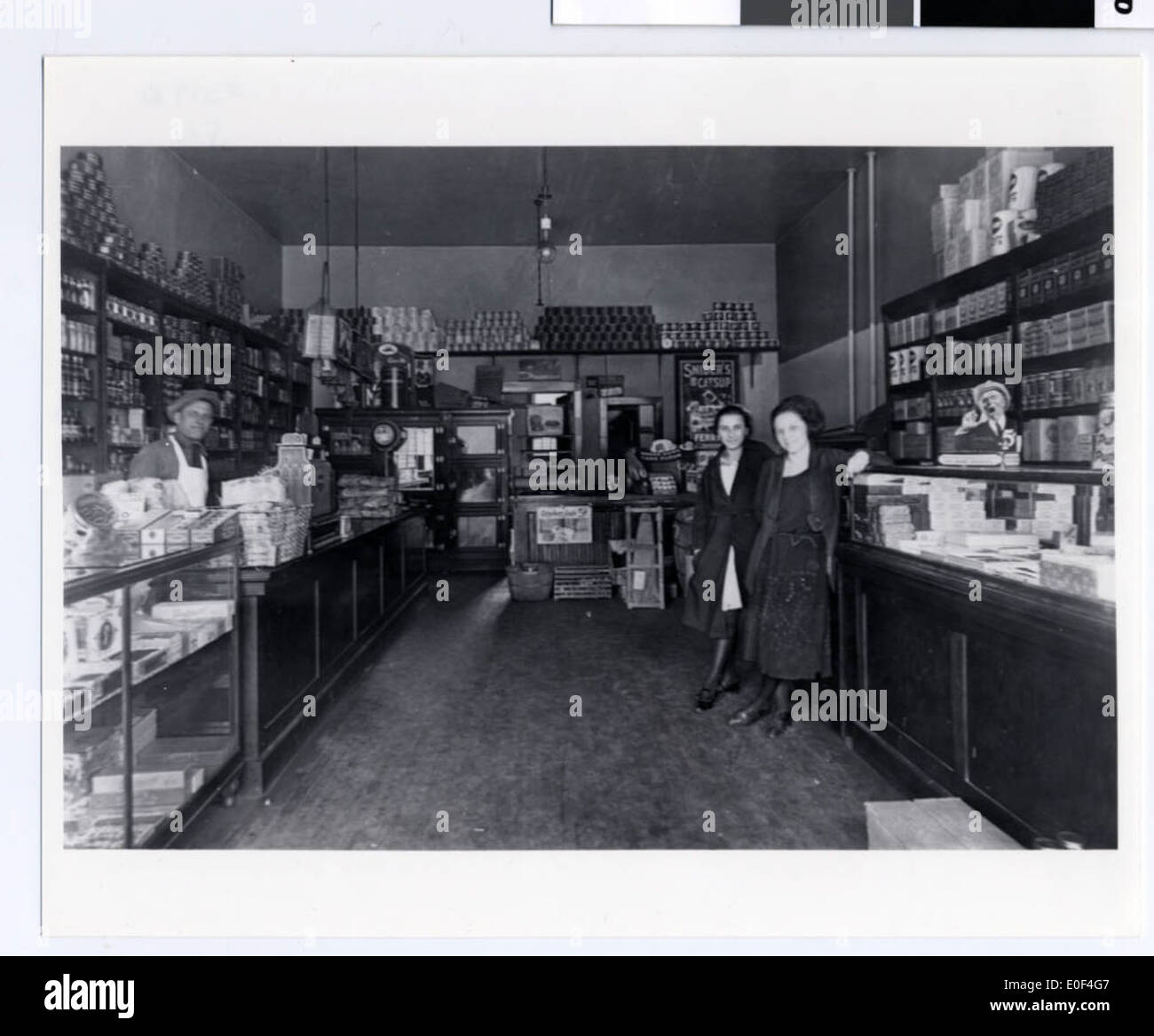 This interior photograph shows the Kenner Grocery Store in Duluth, showcasing the grocery store layout and the importance of such businesses in the local economy during the early 20th century. Stock Photo