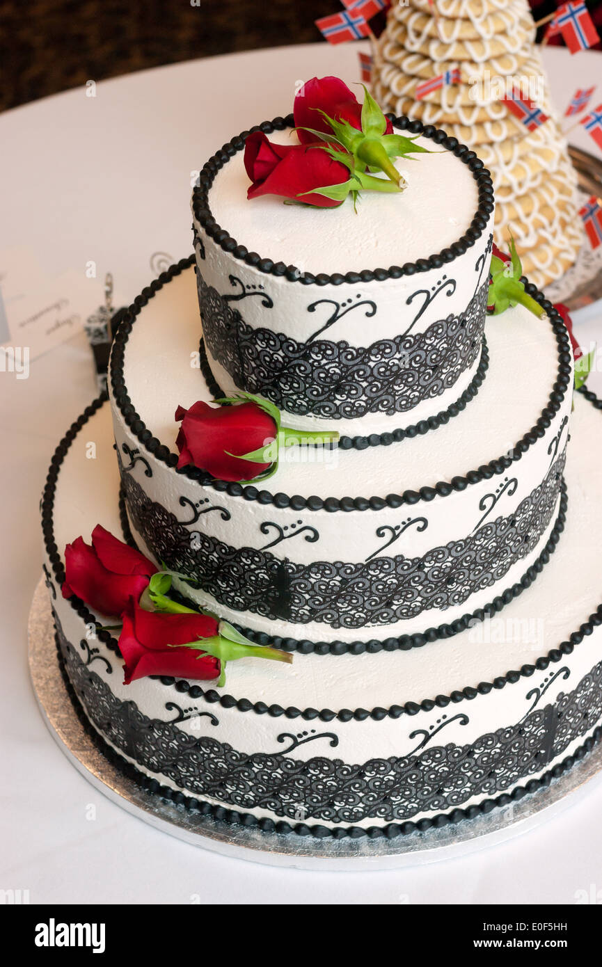 A wedding cake sits waiting to be enjoyed at the reception Stock Photo