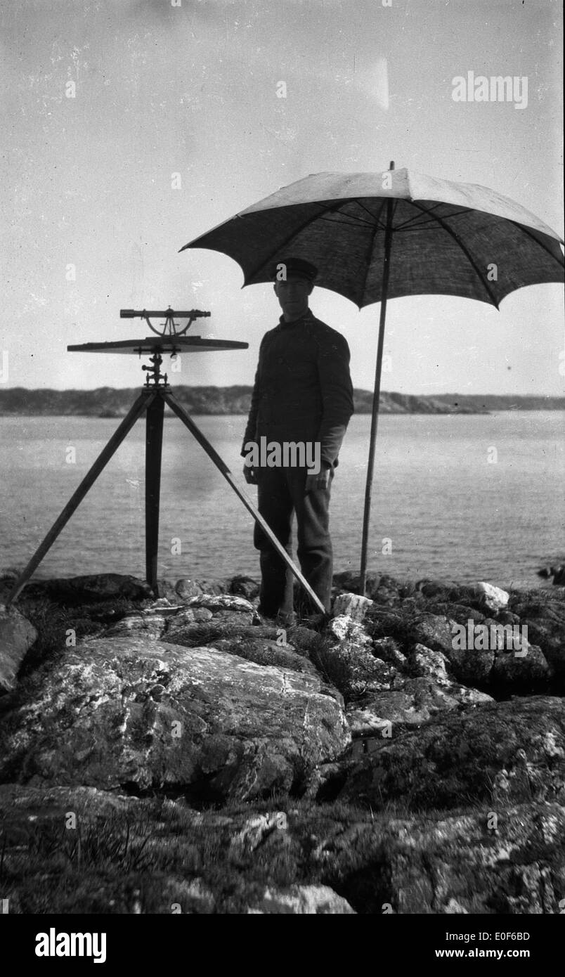 Surveying at Fugløyvågen, Stolmen. Ca. 1918-1920. Stock Photo