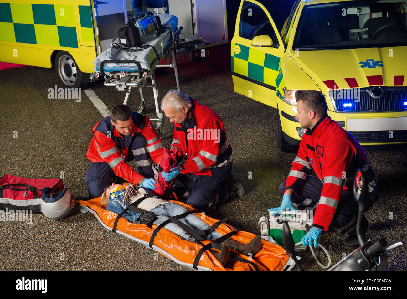 Injured woman on stretcher hi-res stock photography and images - Alamy