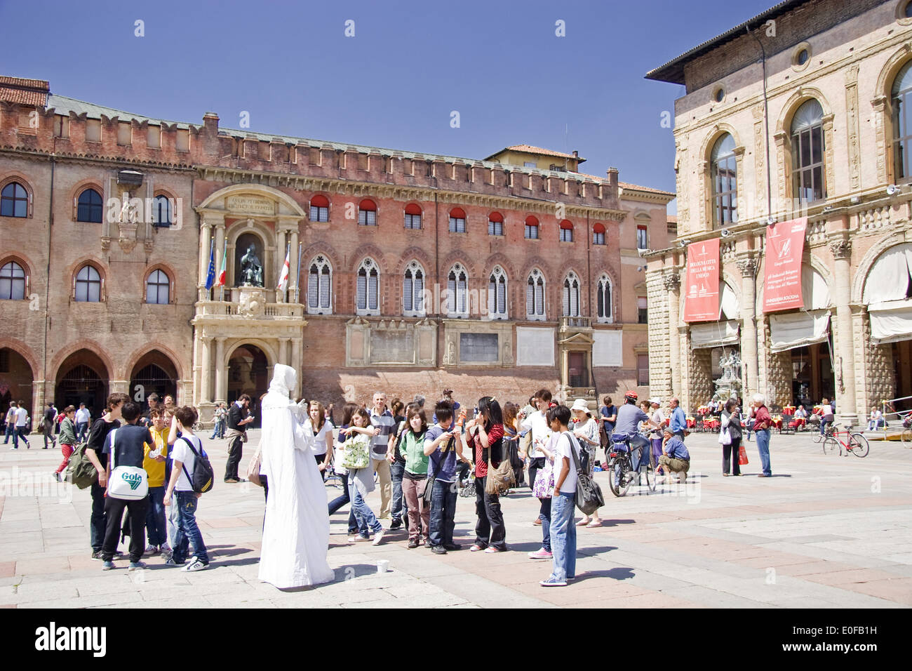 Palazzo d'Accursio (aka Palazzo Comunale, Town Hall). Mimo at Main square, Bologna Stock Photo