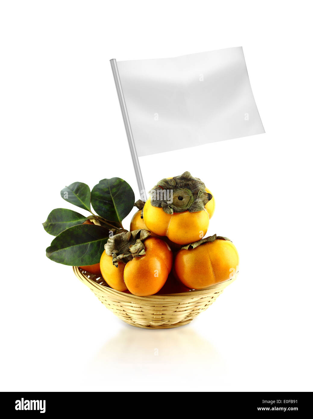 Healthy and organic food concept. Fresh persimmon with flag showing the benefits or the price of fruits. Stock Photo