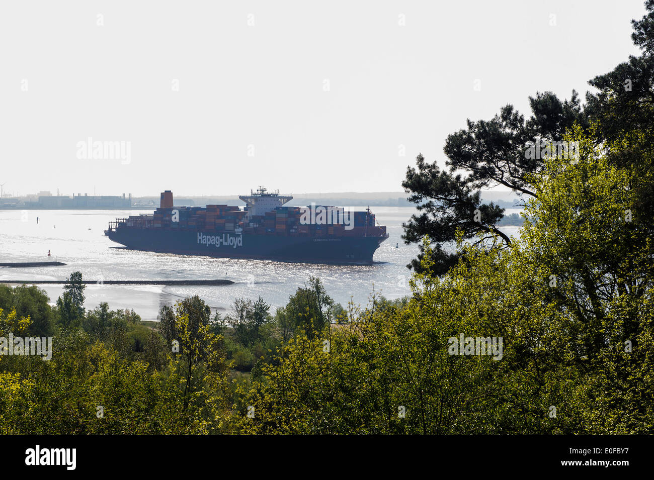 ContainerVessel of the shipping company HapagLloyd on river Elbe near