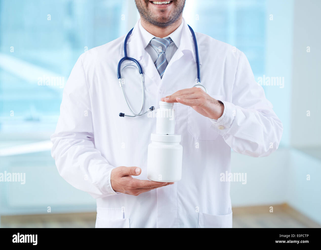 Doctor presenting new medicine hi-res stock photography and images - Alamy