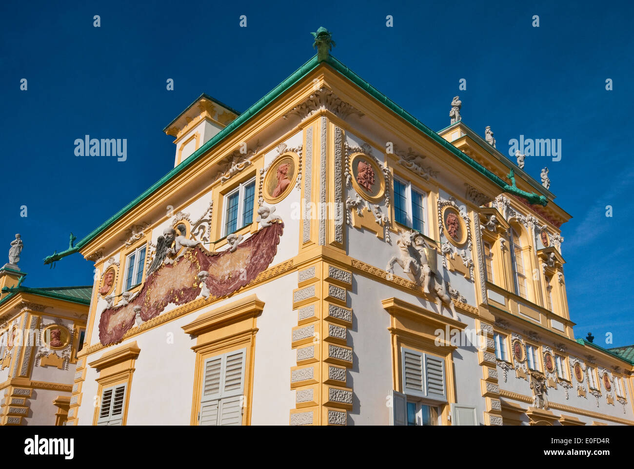 Sundial with Chronos and Pogon on south wall of Wilanów Palace in Warsaw, Poland Stock Photo