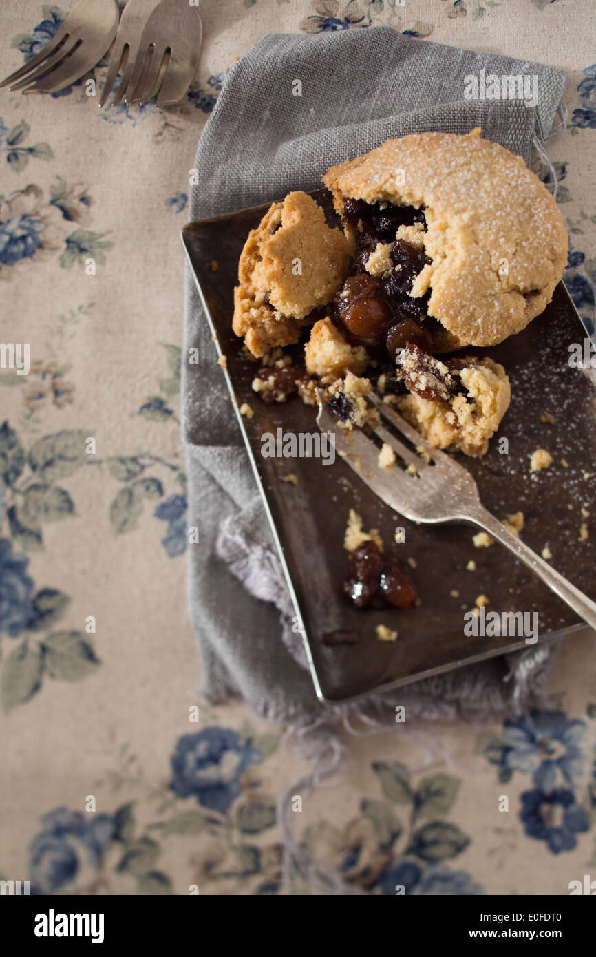 Homemade Mince Pie on silver dish with blue floral tablecloth Stock Photo