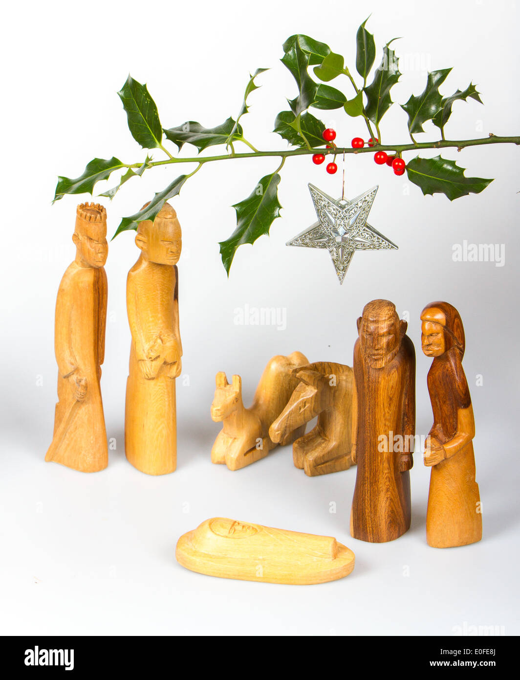 Scene of the Christmas crib, made of wood, isolated Stock Photo Alamy