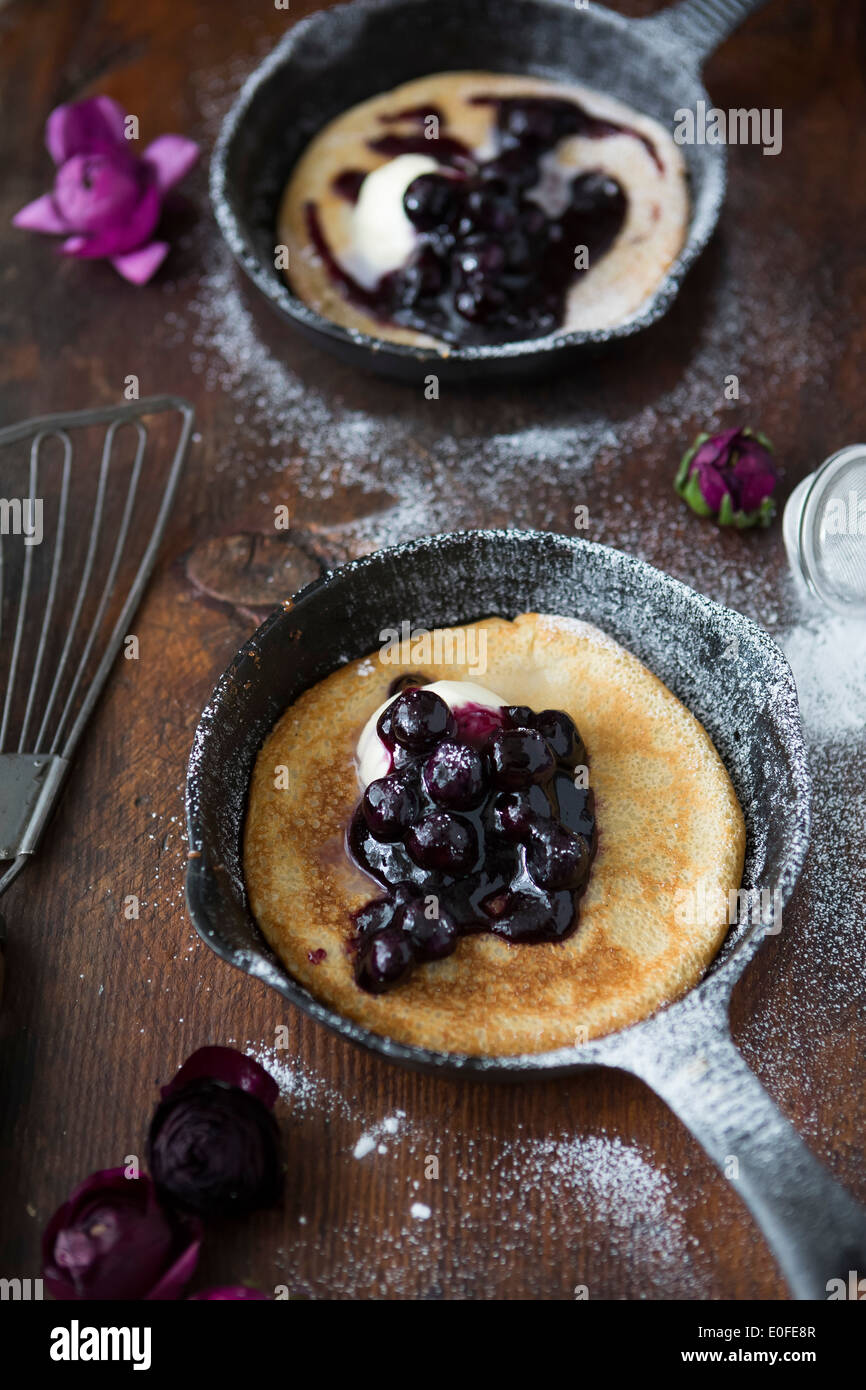 Blueberry and Mascarpone Pancakes in Skillets Stock Photo