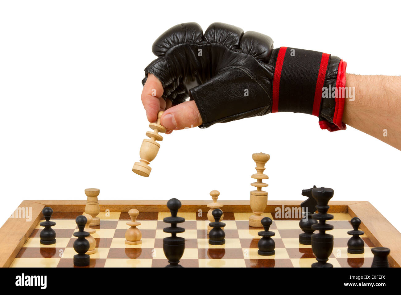 Chess boxers Arik Braun (R) and Felix Bartels sit in front of a chequer  board during the Chess Boxing Championships in Berlin, Germany, 28 July  2012. The chess boxing event took place