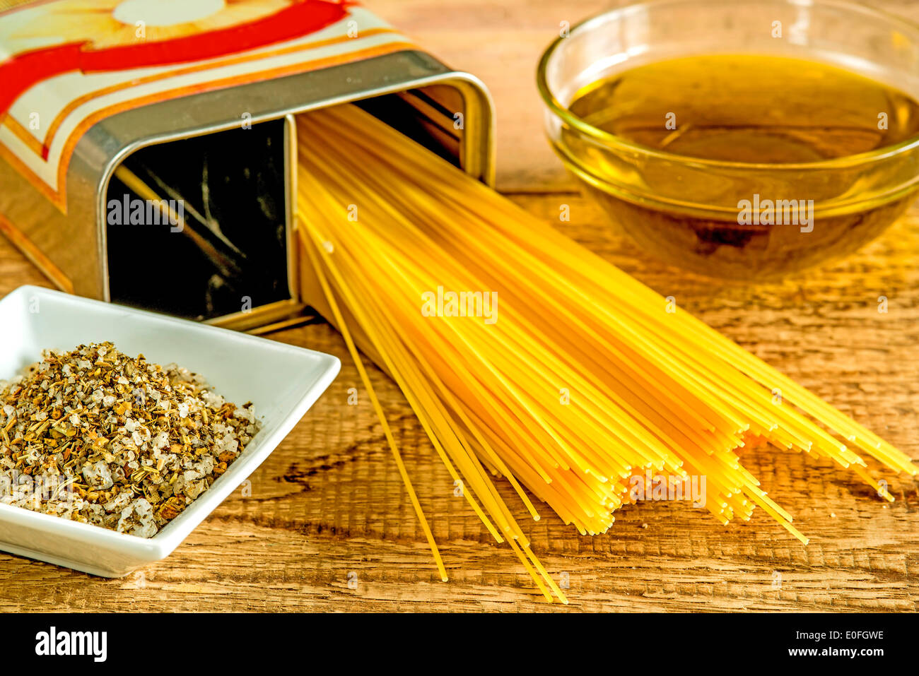 Italian food, olive oil , noodles and herbal salt Stock Photo Alamy