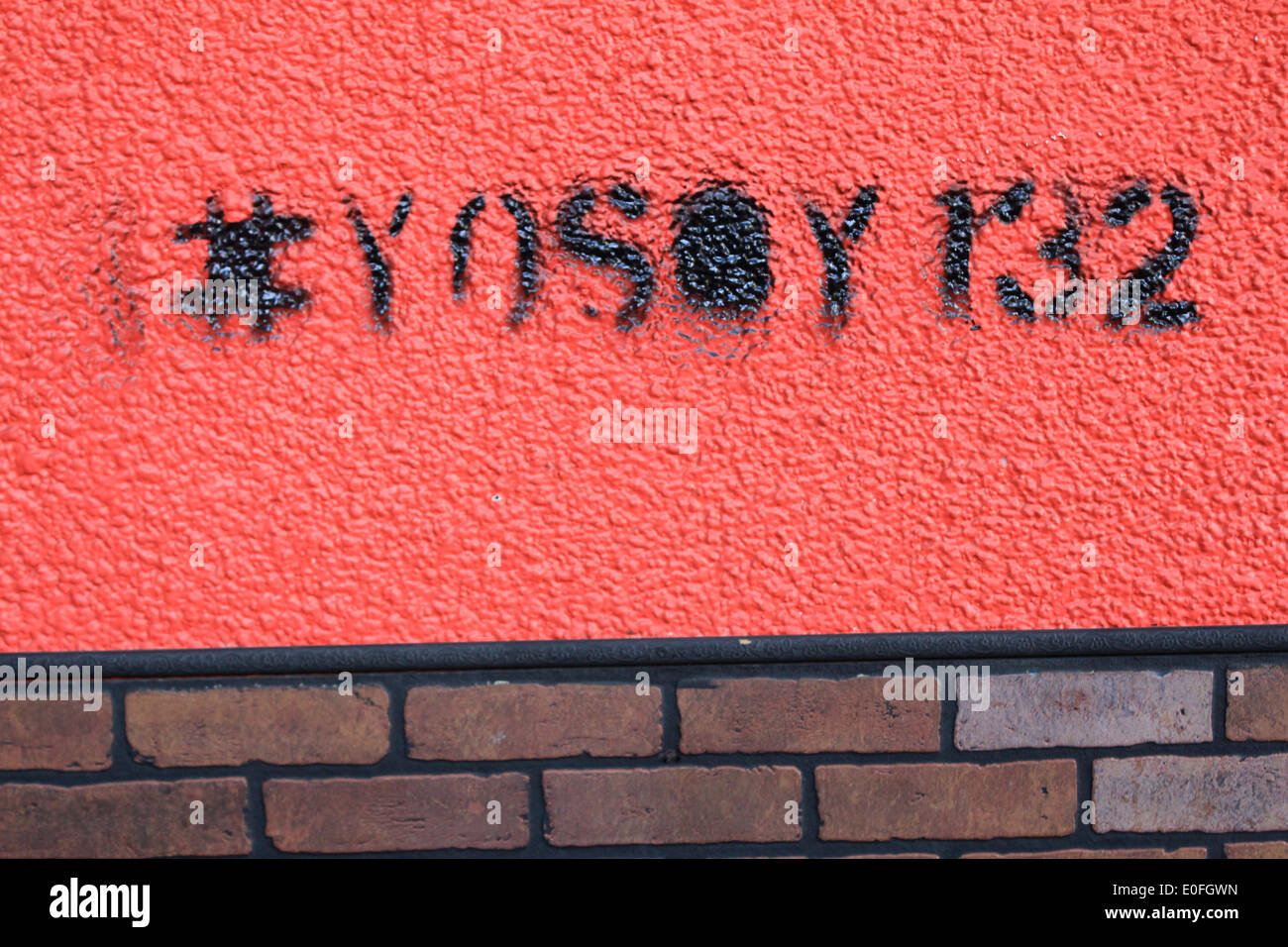 Sign sprayed on red wall which says "Yo Soy 132" referring to student  movement in Mexico City Stock Photo - Alamy