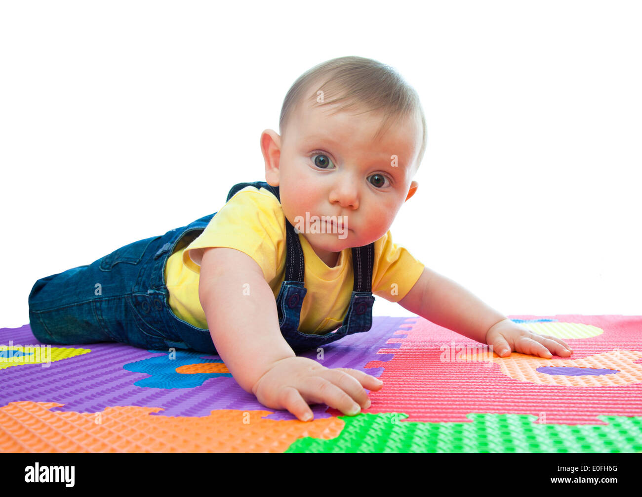 portrait of caucasian bay playing with toy Stock Photo