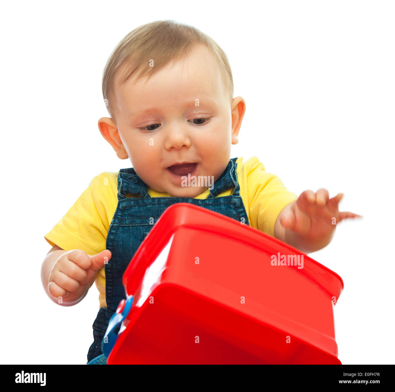 portrait of caucasian bay playing with toy Stock Photo