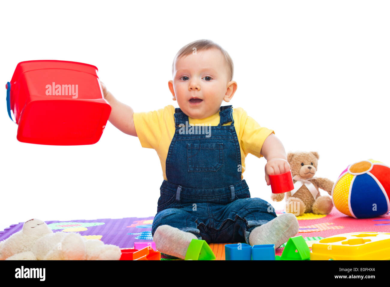 portrait of caucasian bay playing with toy Stock Photo