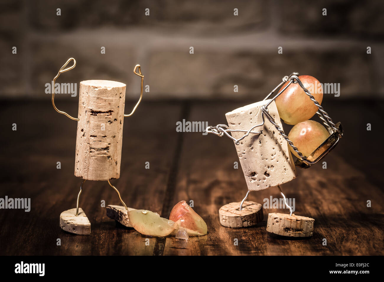 Concept Trouble between boss and employee, wine cork figures Stock Photo