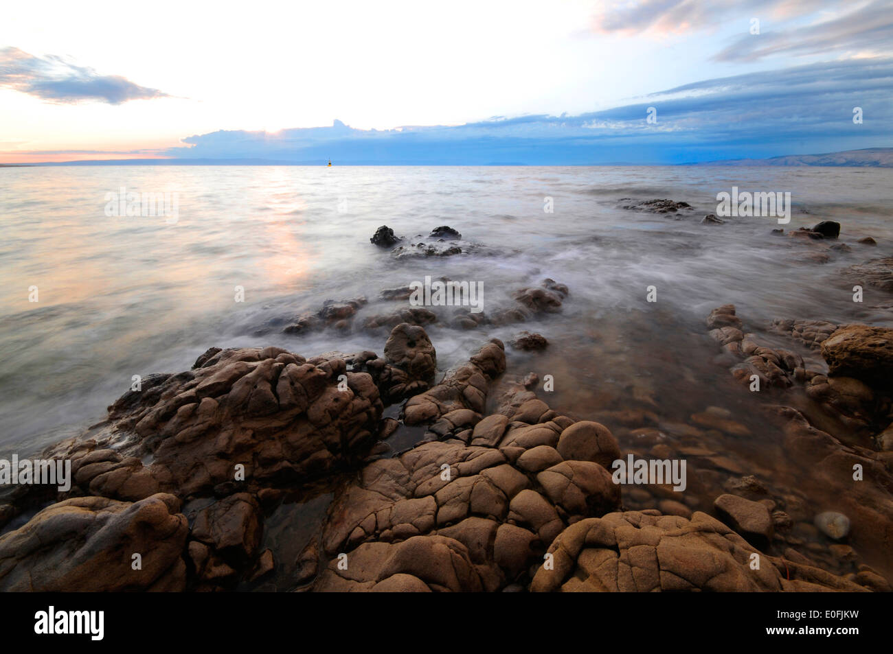 Last ray of light near the sea. Just few moments before sunset in Croatia Stock Photo