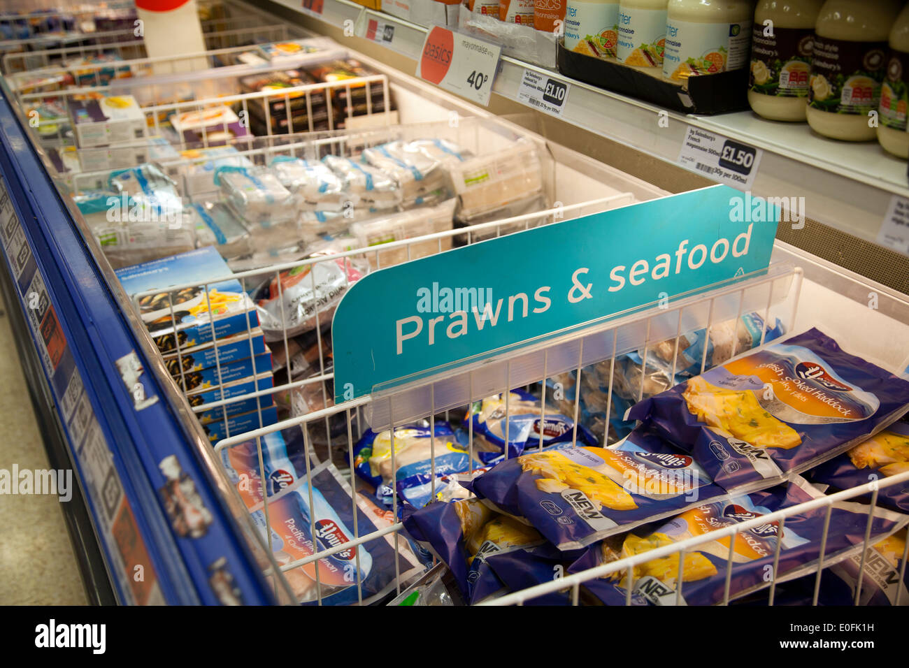 Frozen Prawns and Seafood Sign Fridge - London UK Stock Photo