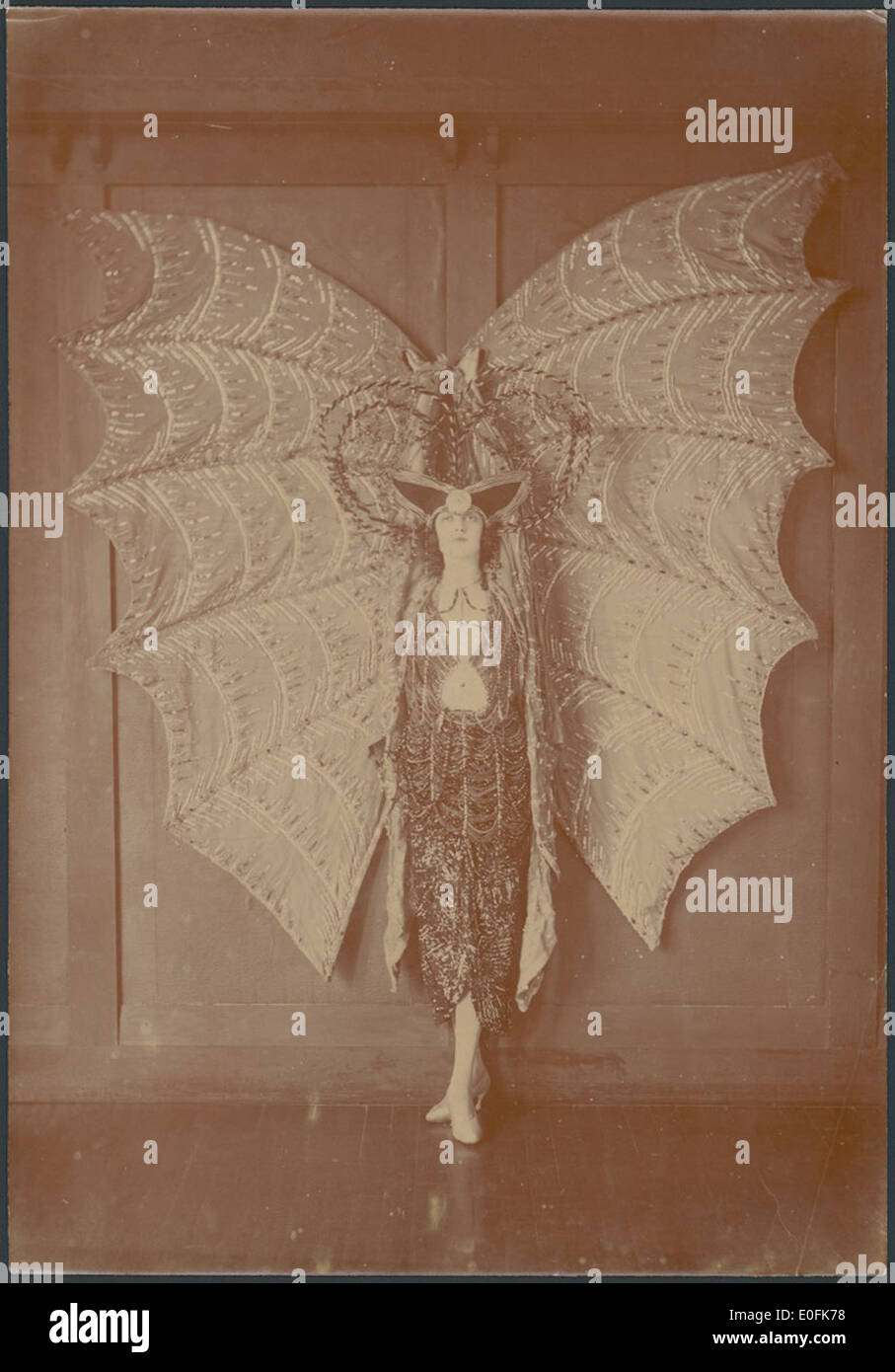 Portrait of Pixie Herbert in a bat costume, ca. 1923 Stock Photo