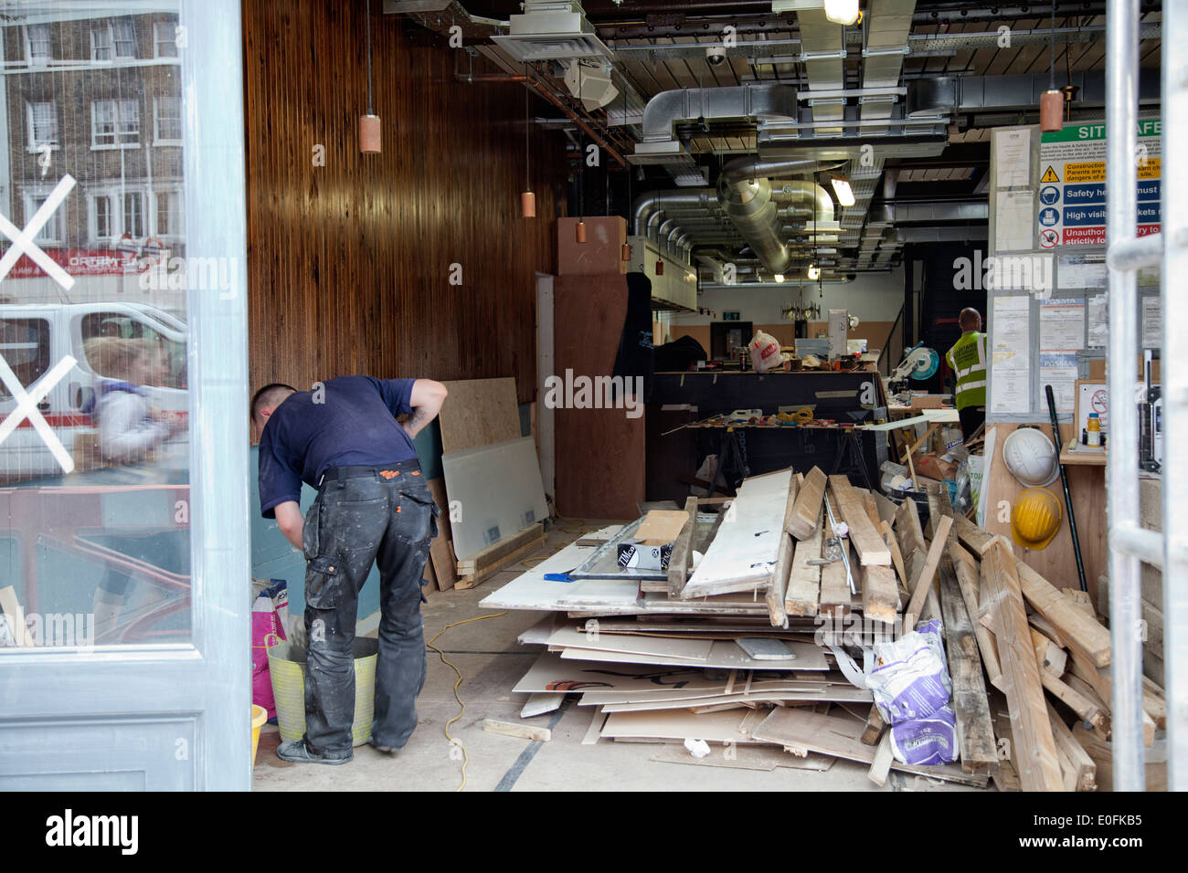 Shop Fitters at Work on soon to be Byron Burgers in Clapham - London SW4 Stock Photo