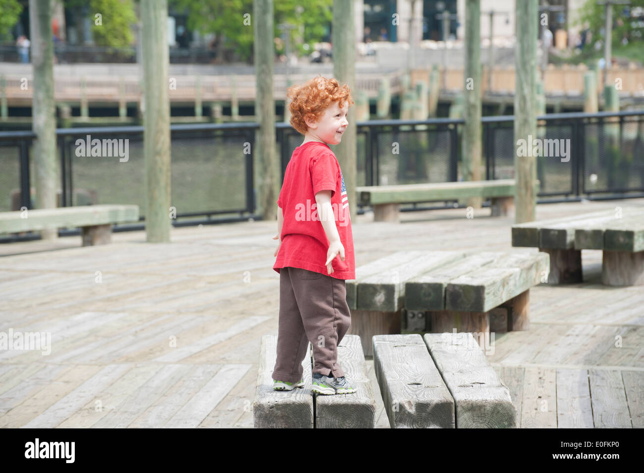 Boy playing at the park hi-res stock photography and images - Alamy