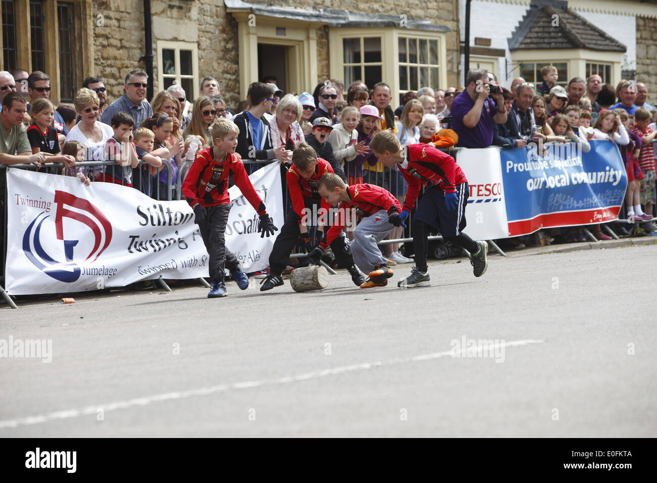 The quirky annual cheese rolling held in Stilton on May Day Bank Holiday Monday, in Stilton, Cambridgeshire, England, Britain Stock Photo