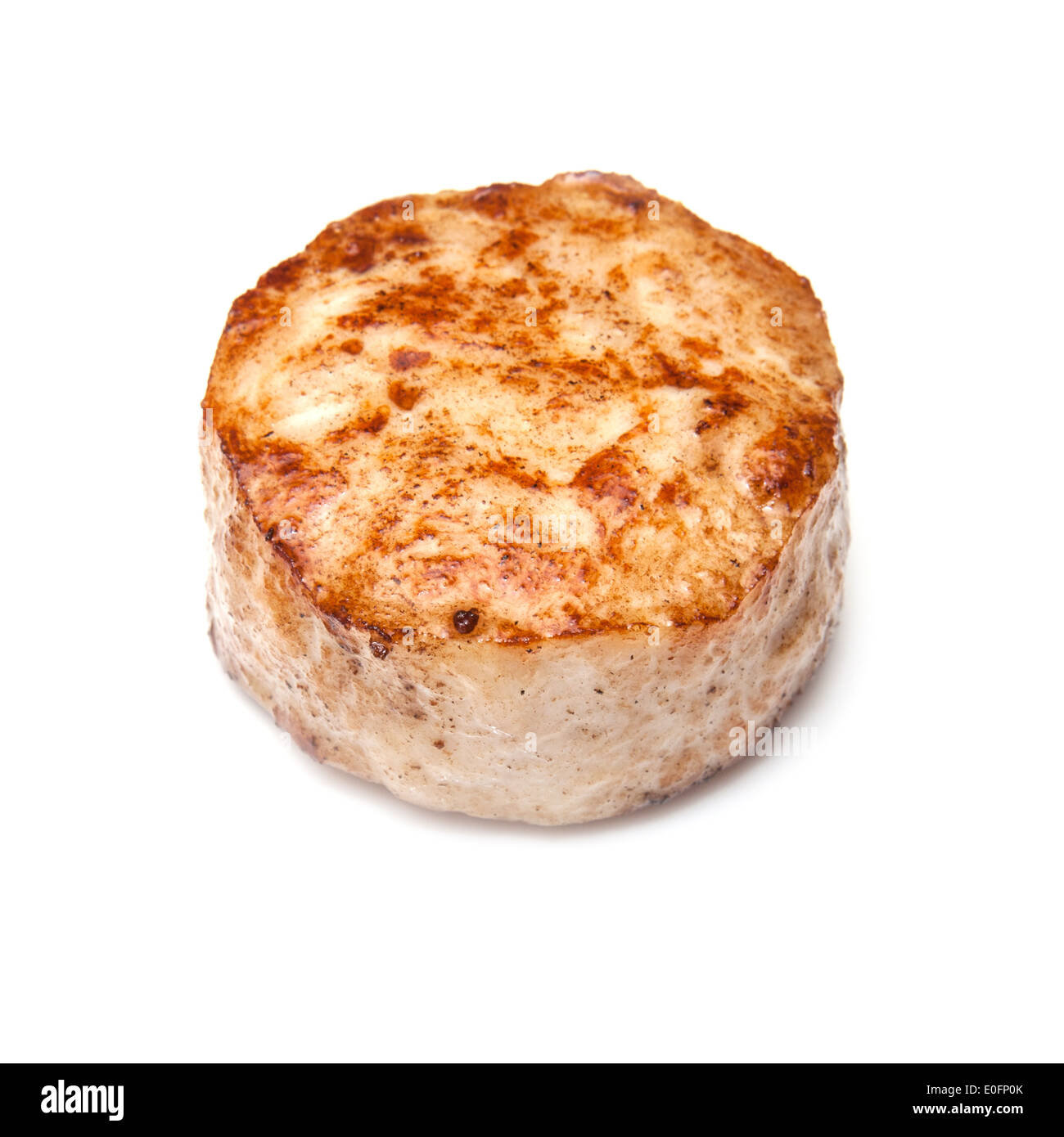 Cooked crocodile meat isolated on a white studio background Stock Photo