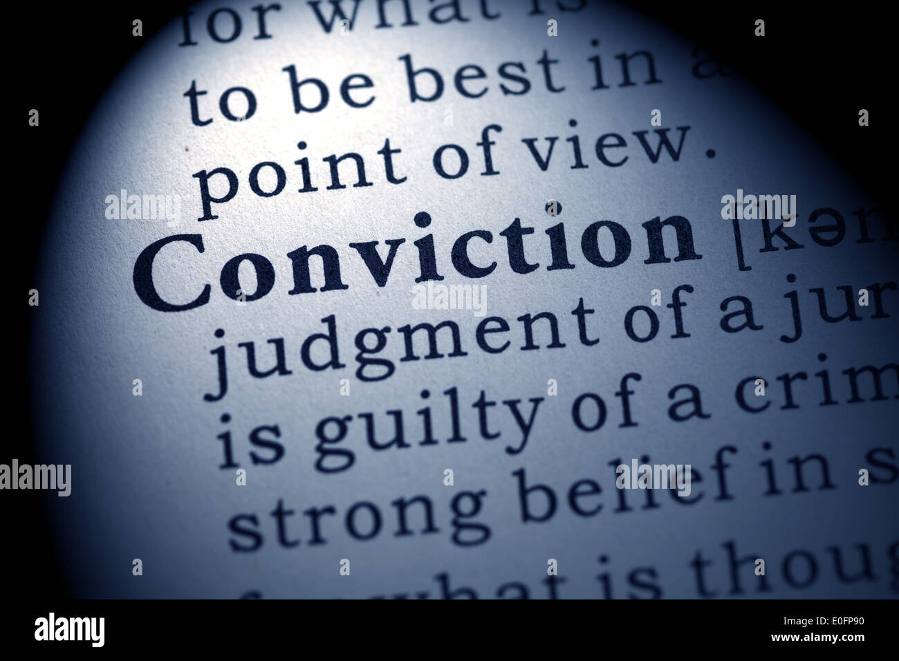 Fake Dictionary, Dictionary definition of the word conviction. Stock Photo
