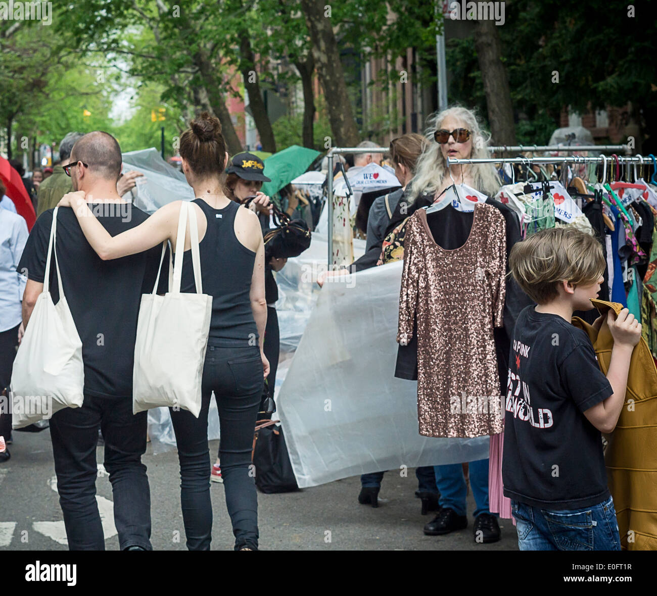 Shoppers search for bargains at a flea market in the New York neighborhood of Greenwich Village Stock Photo