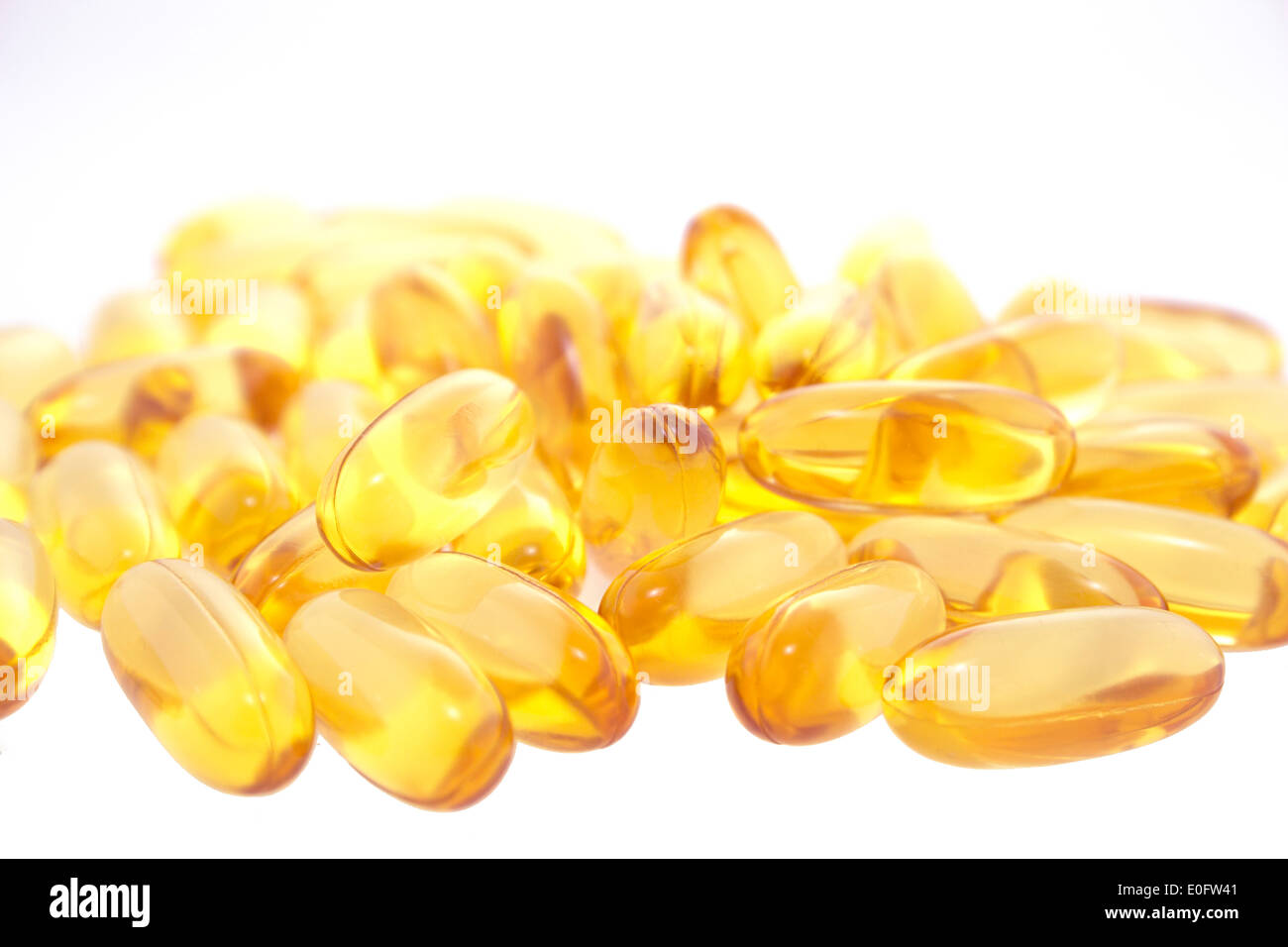 Cod liver oil omega 3 gel capsules isolated on white background Stock Photo