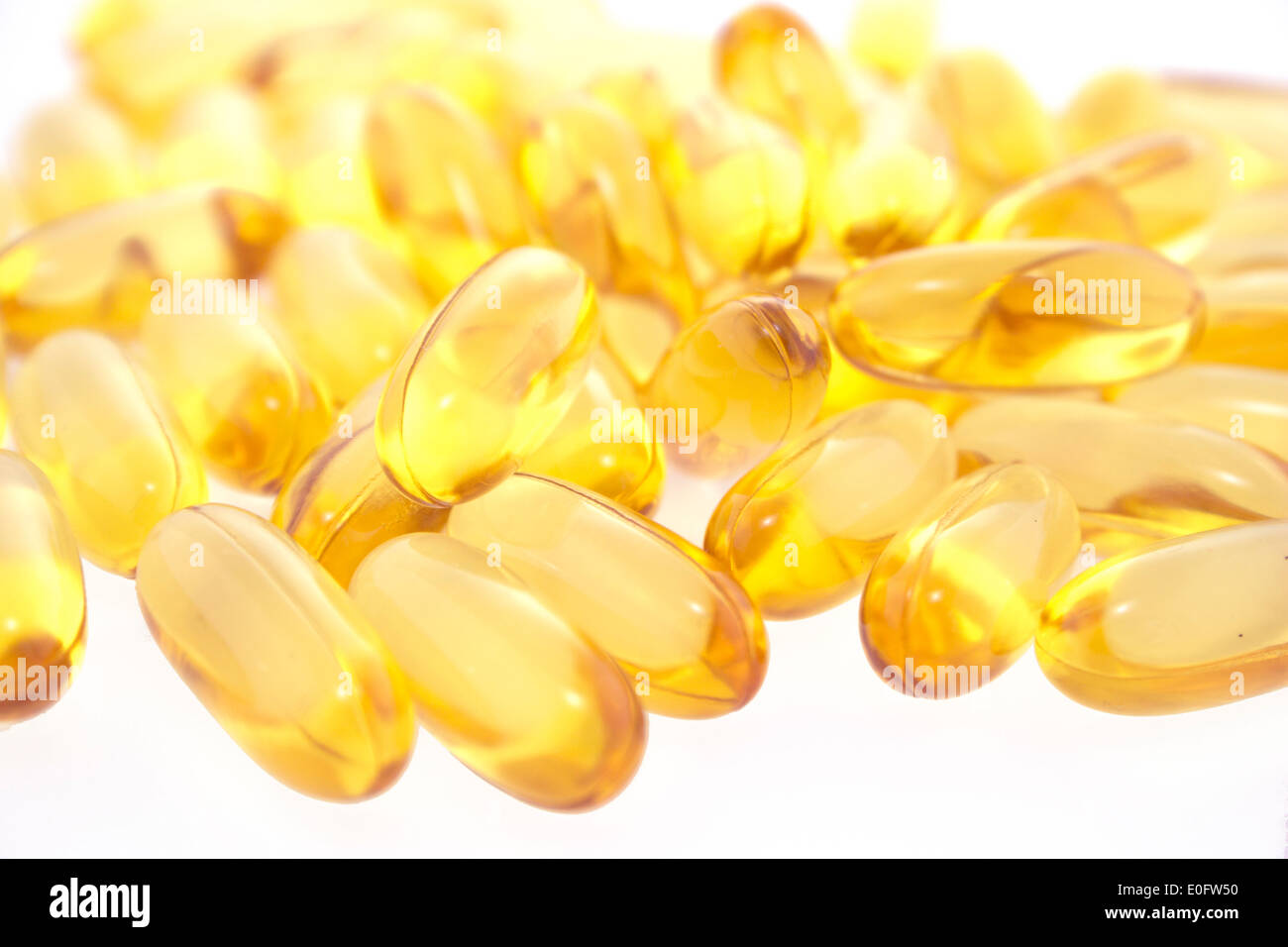 Cod liver oil omega 3 gel capsules isolated on white background Stock Photo