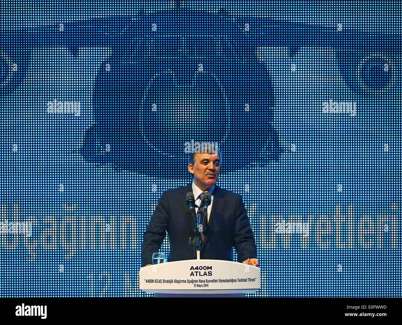 Istanbul, Turkey. 12th May, 2014. Turkish President Abdullah Gul speaks during the official handover ceremony in Kayseri, Turkey, on May 12, 2014. The ceremony of introduction of A400M transport aircraft was held on Kayseri Air Force Transport Base on Monday. Turkey is continuing its policy of strengthening its armed forces to meet the challenges of the country's difficult neighborhood, local media quoted Turkish President Abdullah Gul as saying on Monday. © Cihan/Xinhua/Alamy Live News Stock Photo