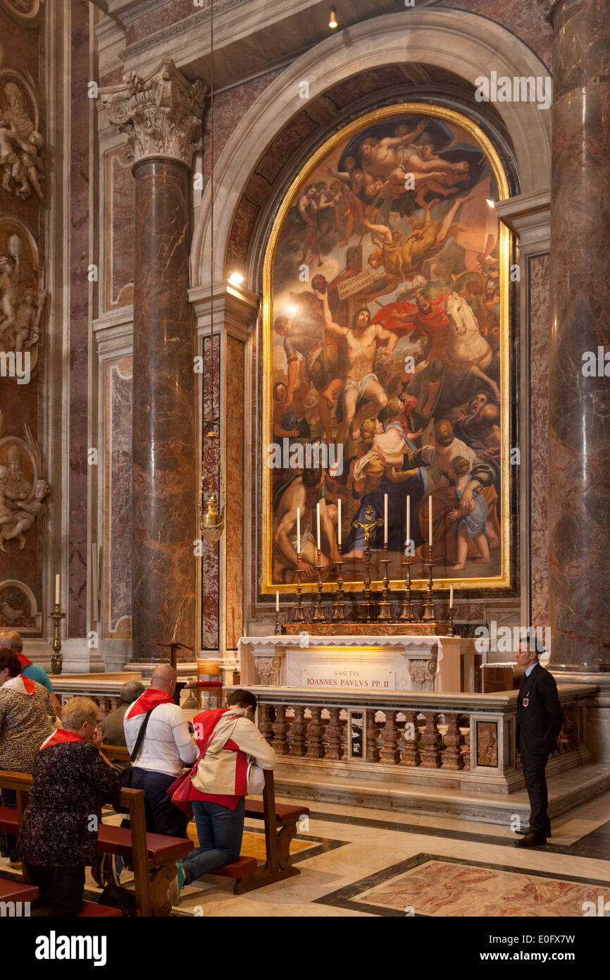 People praying at the chapel of St Sebastian, St Peters Basilica Church