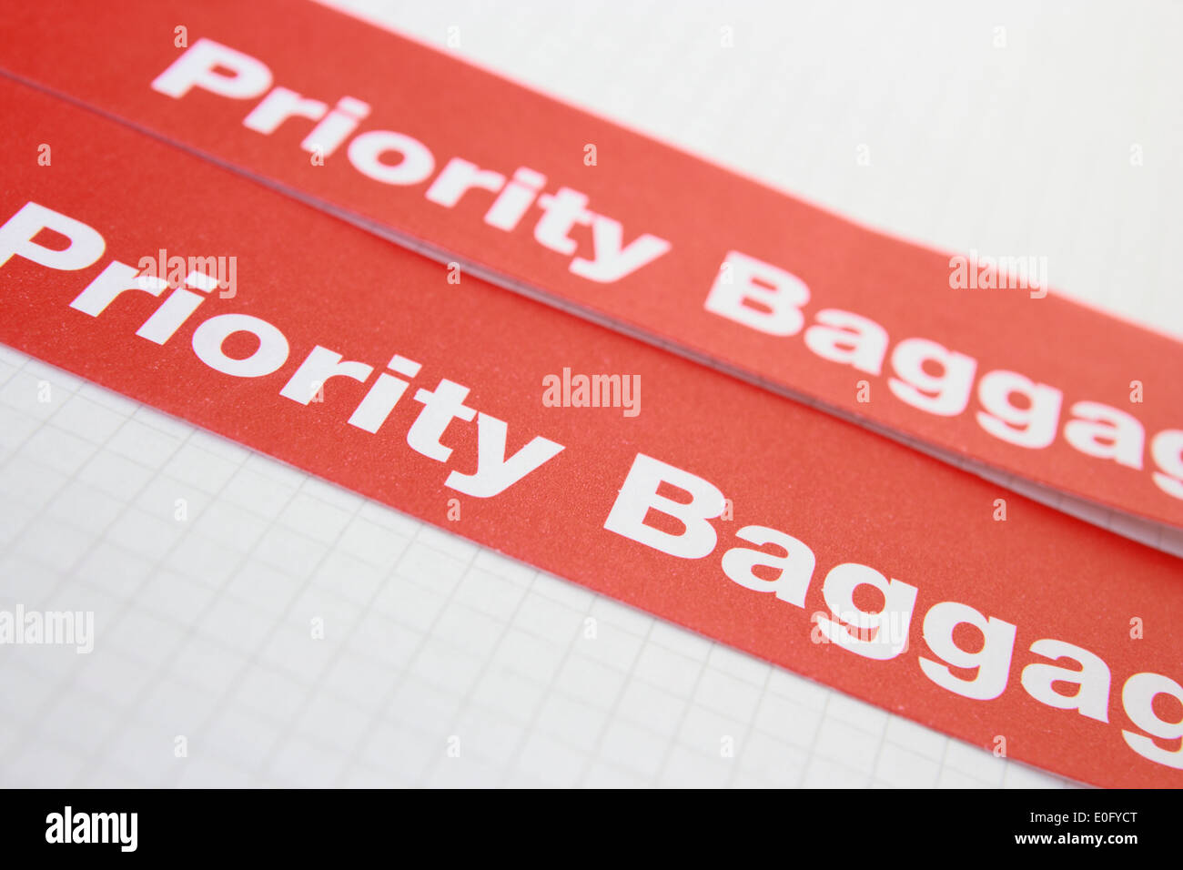 red label priority for baggage Stock Photo