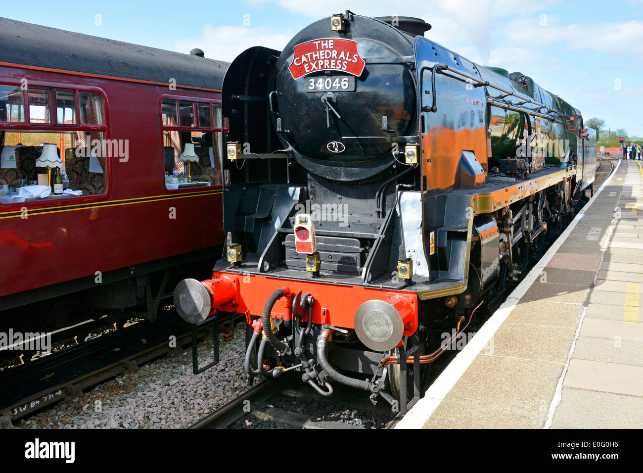 Preserved steam engine 34046 Braunton runs round its carriages at Stratford upon Avon railway station Stock Photo