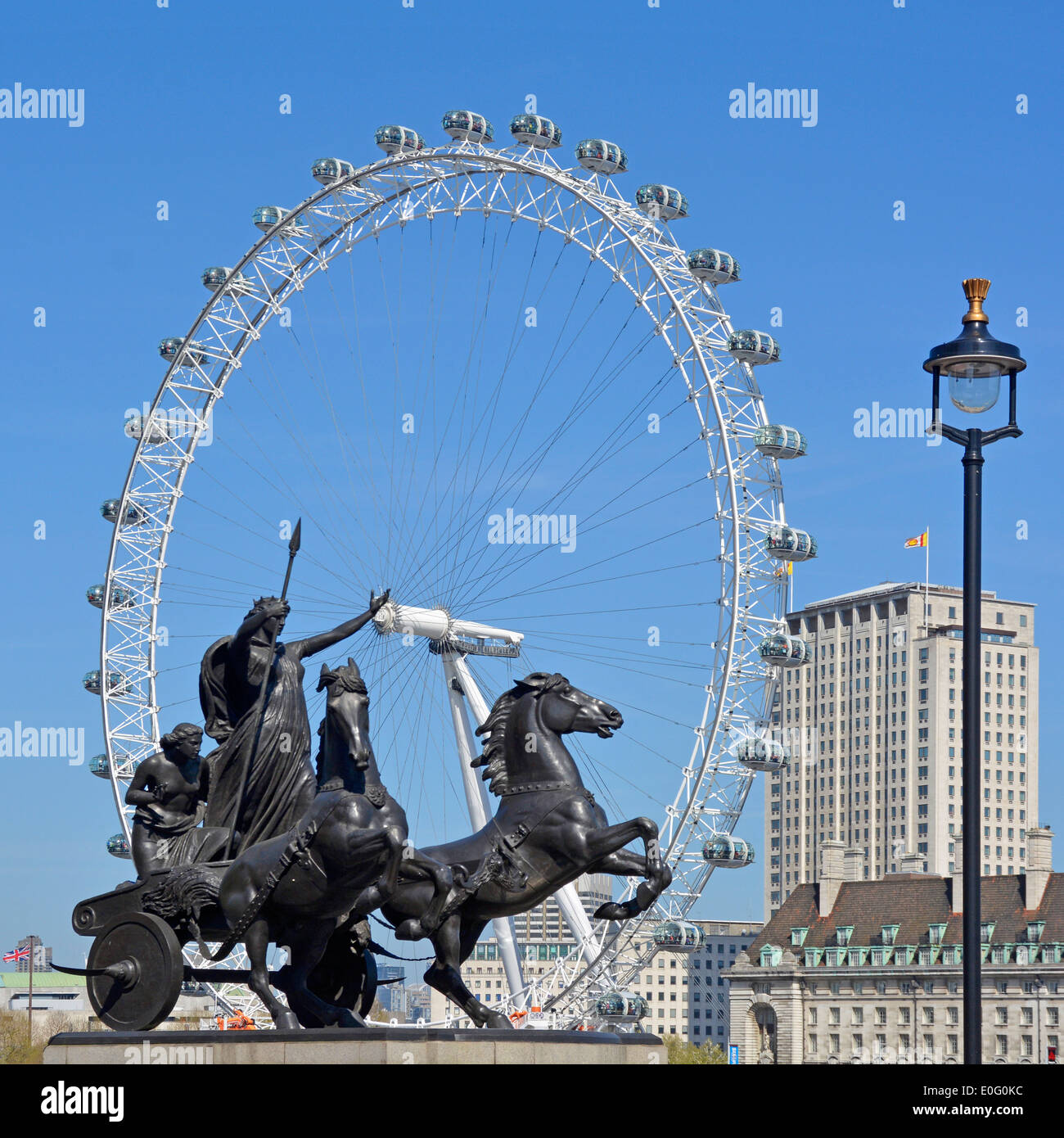 Boadicea Chariot sculpture at Westminster Bridge with London Eye and Shell building beyond Stock Photo