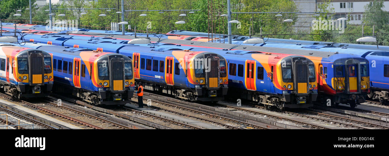 Public transport close up passenger train front end some of Stagecoach South West Trains in depot at Clapham Junction railway station South London UK Stock Photo