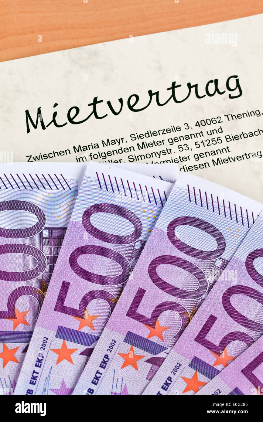 A lot of euro of bank notes and hire contract, Viele Euro Geldscheine und Mietvertrag Stock Photo